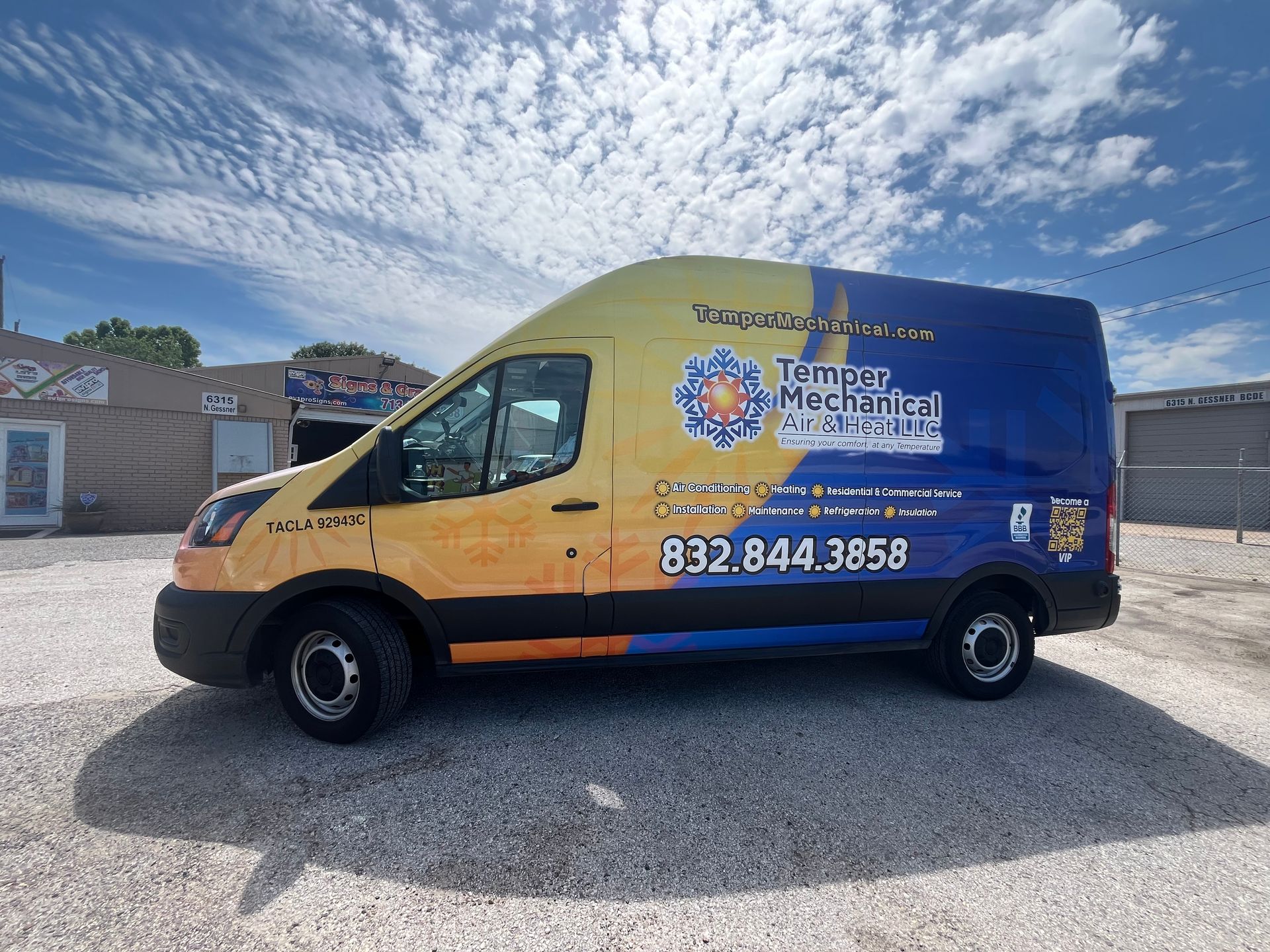 Yellow and blue service van with 