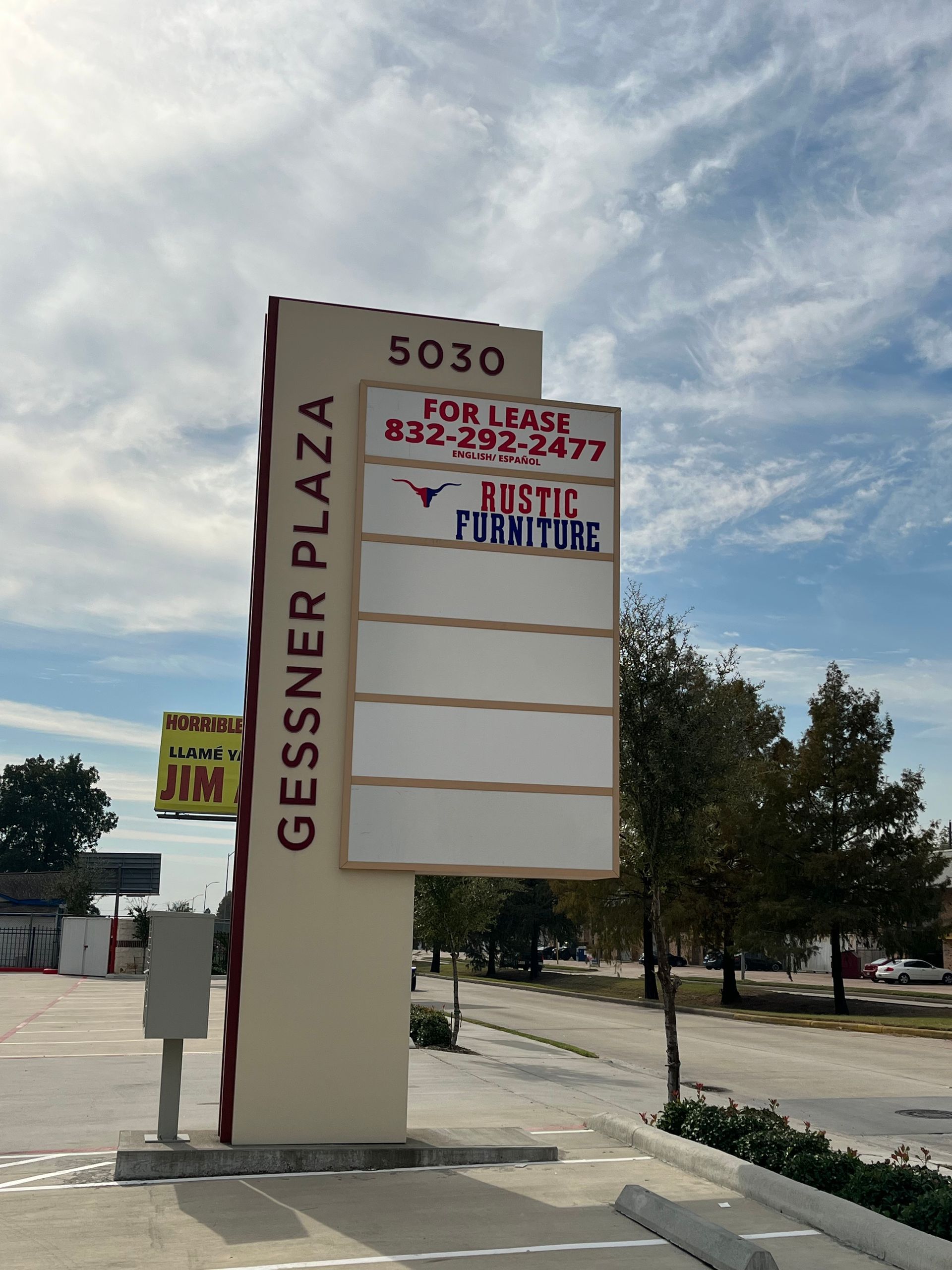 Sign for Gessner Plaza with 