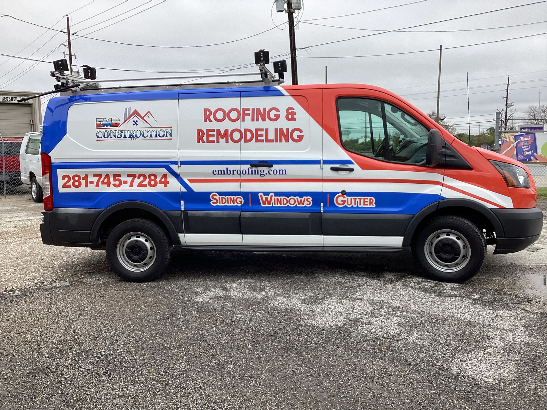 Red, white, and blue van with 