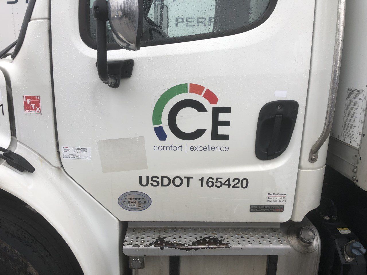 A white truck with usdot 165420 on the side