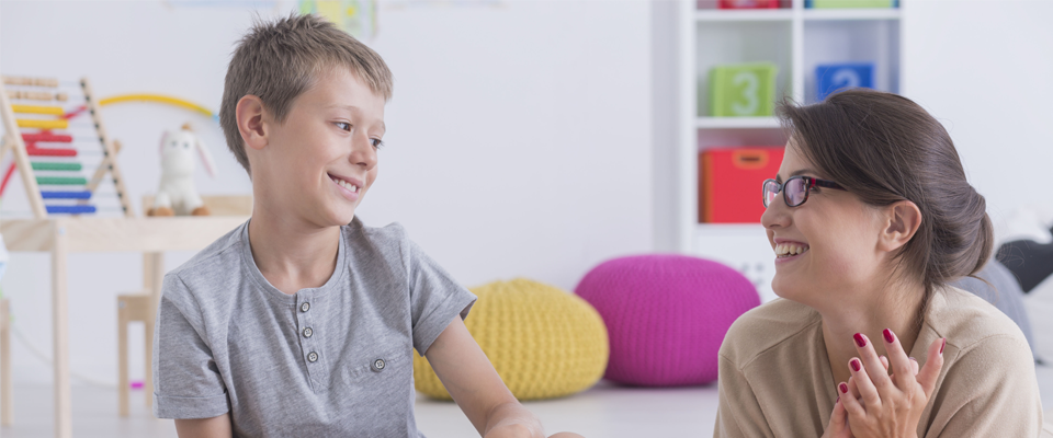 Happy child during therapy