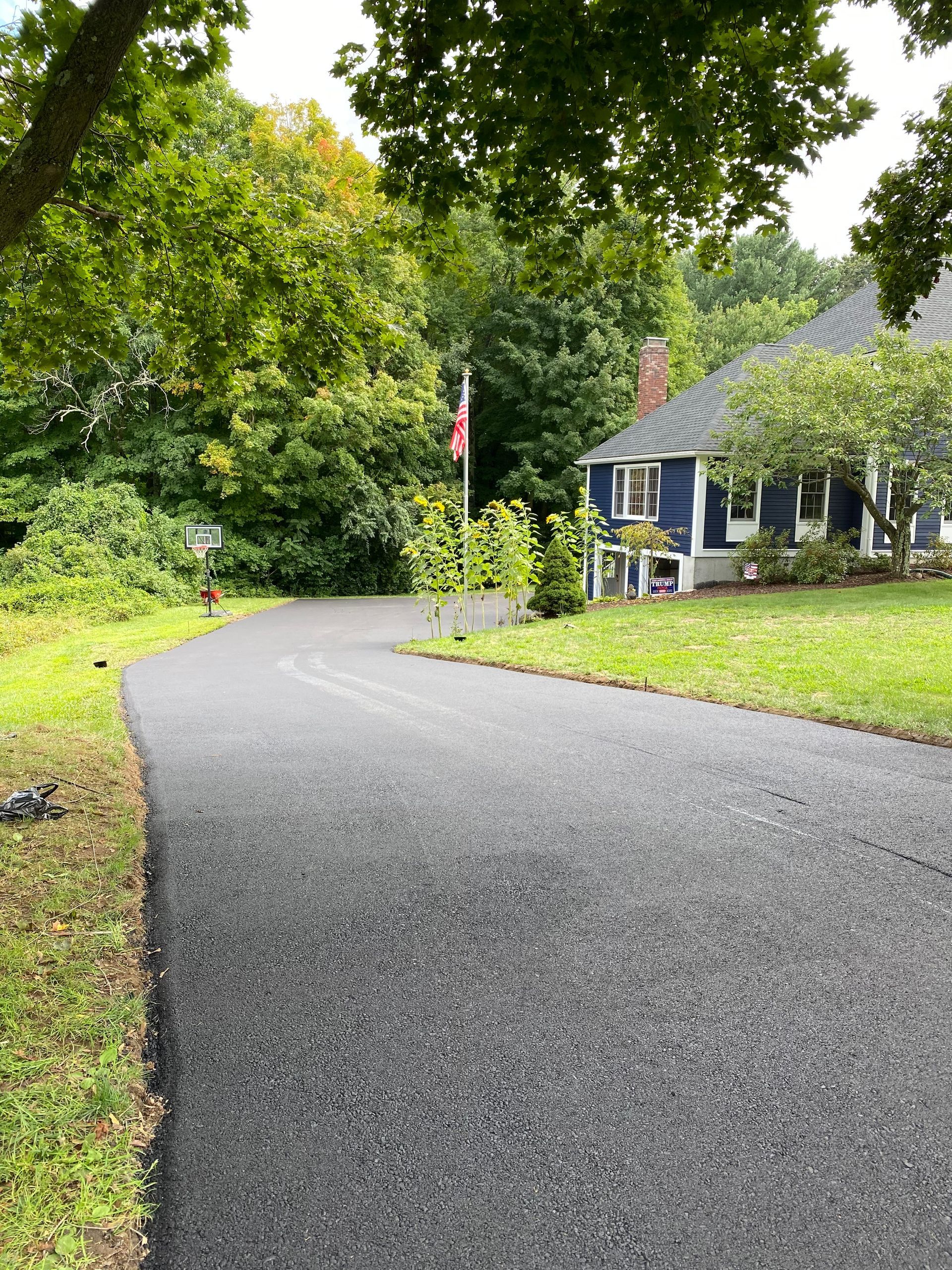 A beautiful property with a fine asphalt driveway