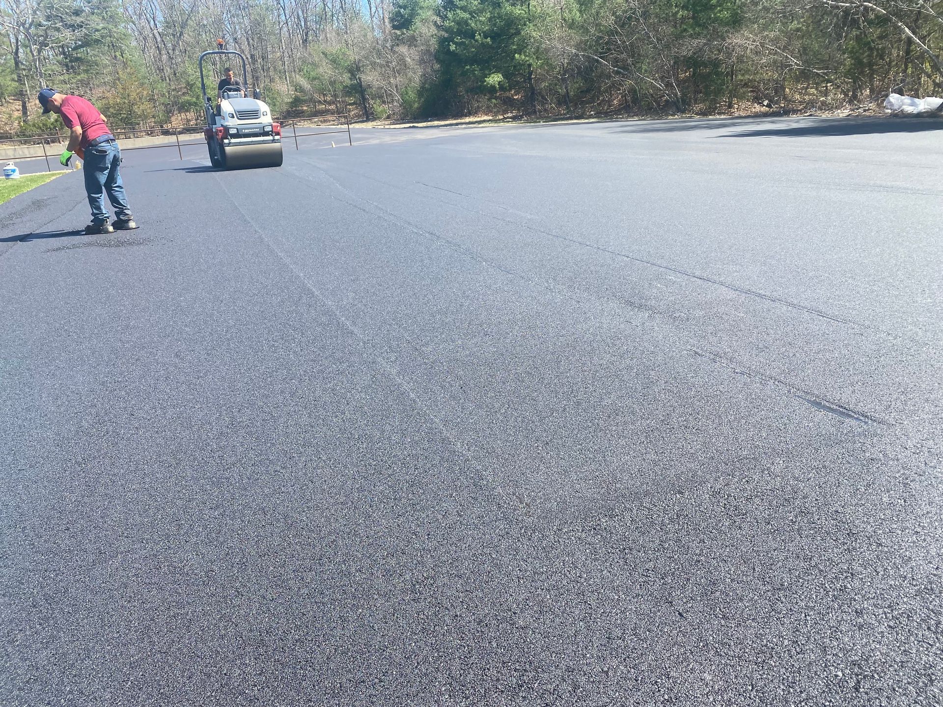 Young's Paving experts working on a street