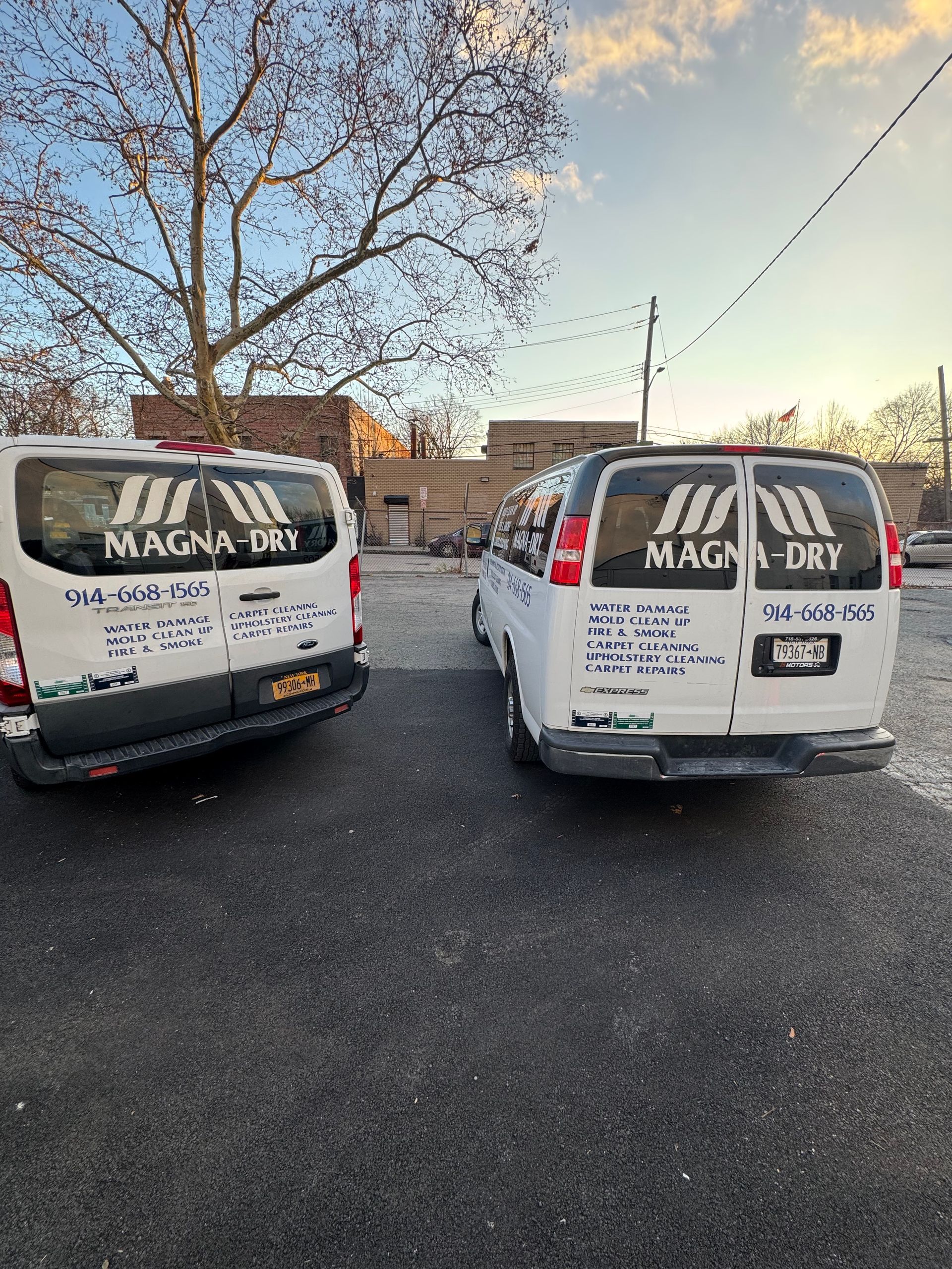 Two white vans with 
