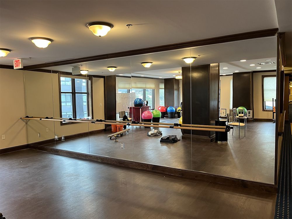There is a large mirror in the middle of the room.