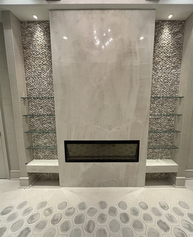 There is a fireplace in the middle of the room.