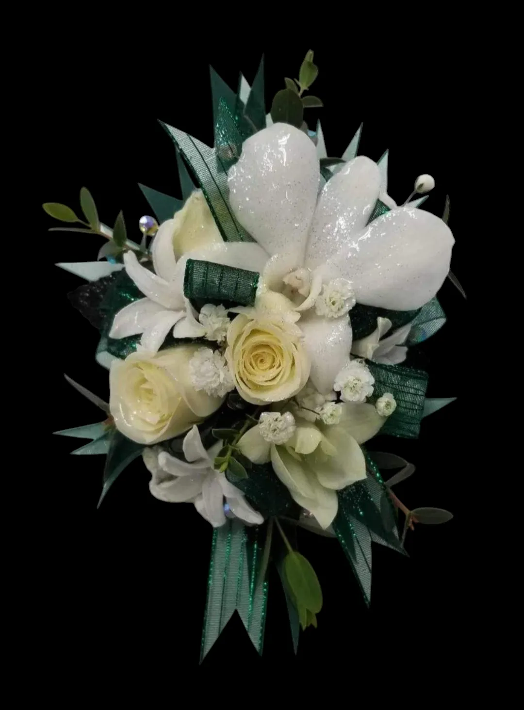 White and cream floral arrangement with green accents on black background.