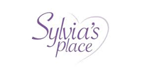Logo for Sylvia's Place, written in purple cursive with a heart outline.