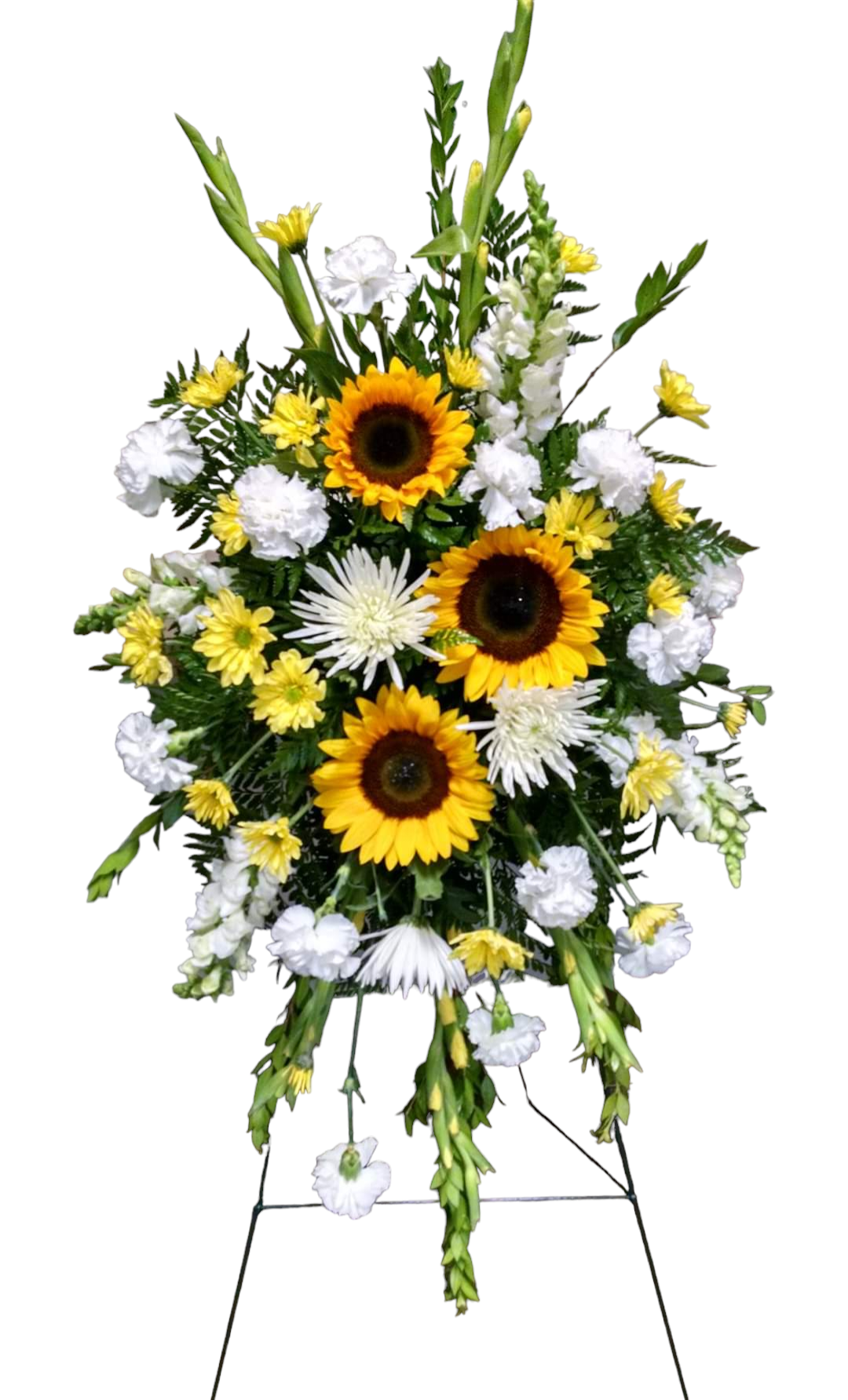 Floral arrangement in yellow and white, on a wire stand. Features sunflowers, carnations, and mums.