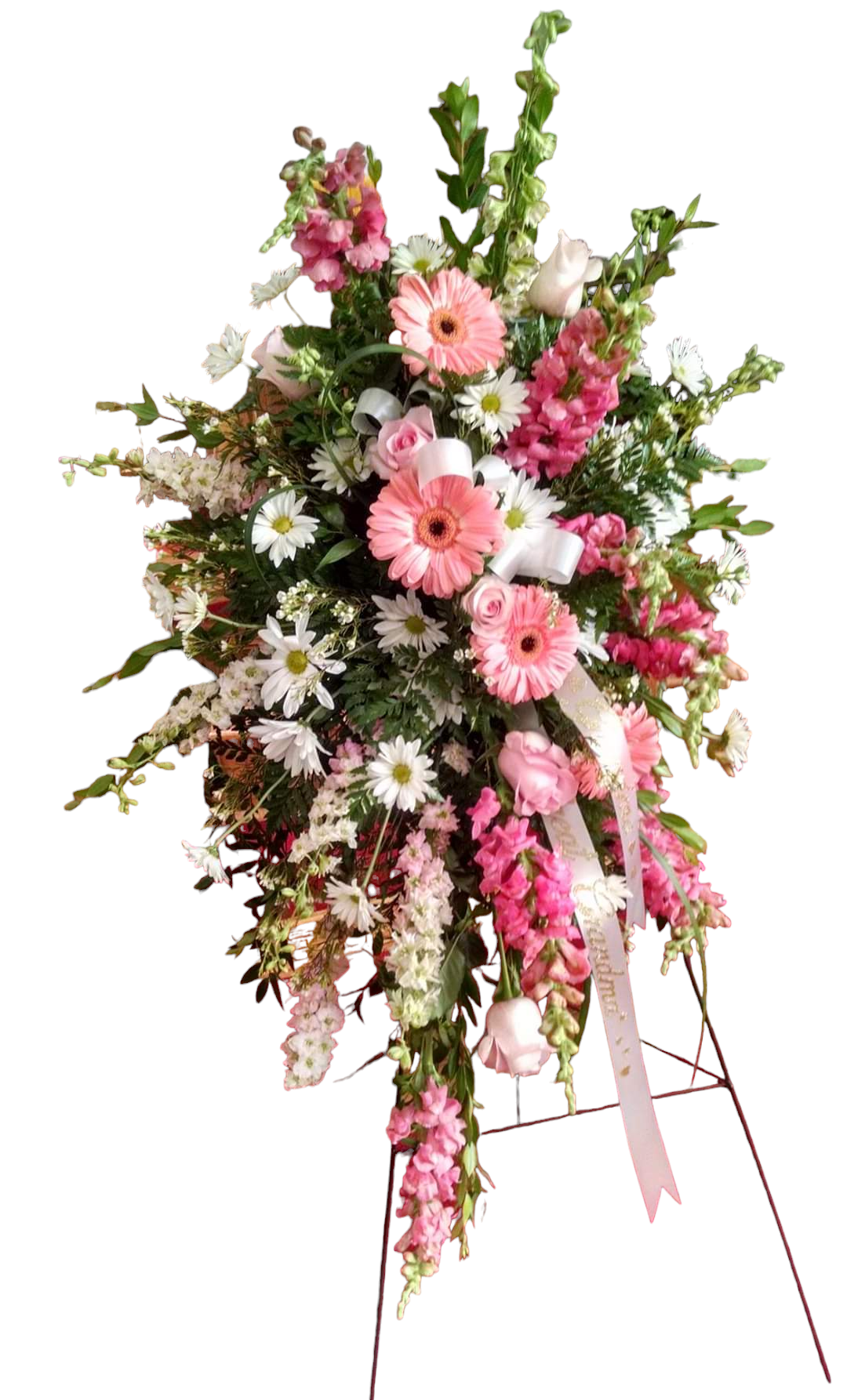 A floral standing spray with pink and white flowers for a memorial service.