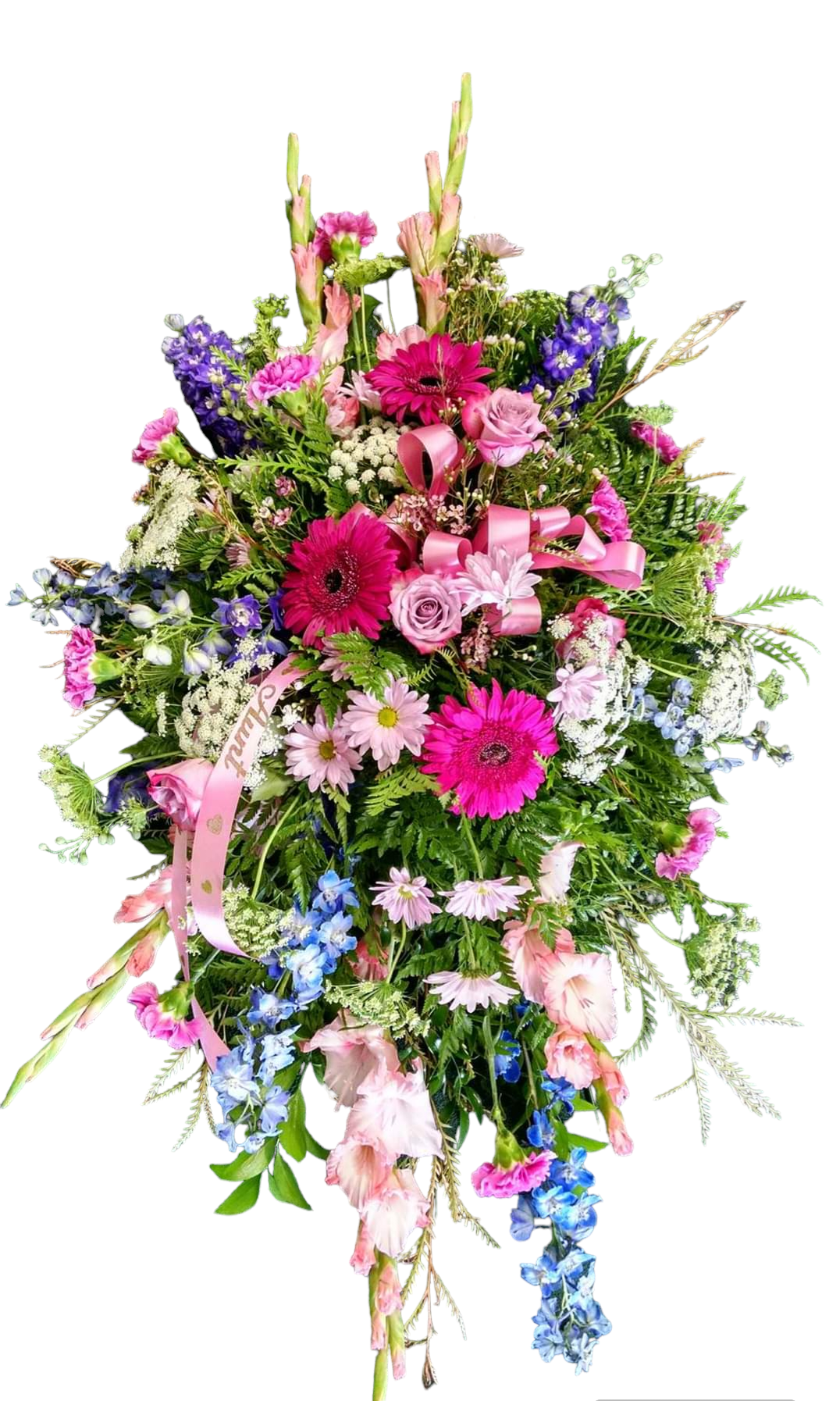 Colorful floral arrangement with pink, purple, and blue flowers, accented with greenery and bows.