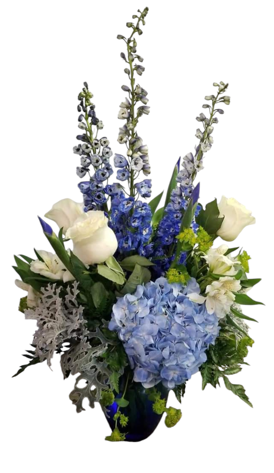 Blue and white flower arrangement, including roses, hydrangea, and delphinium.