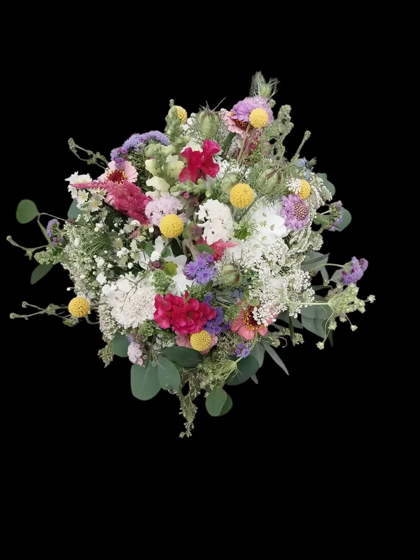 Colorful wildflower bouquet against a black background.