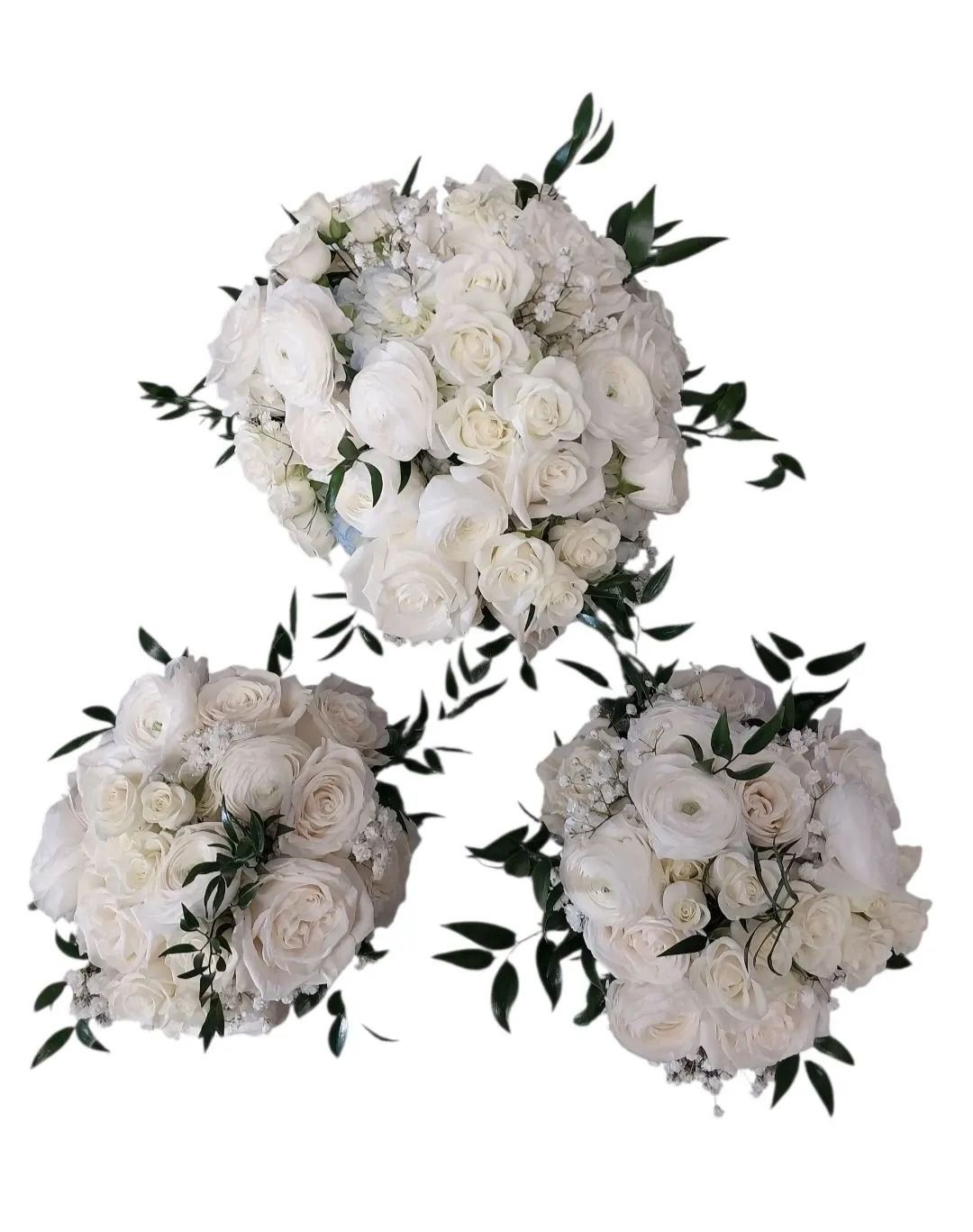 Three white flower bouquets with green foliage.