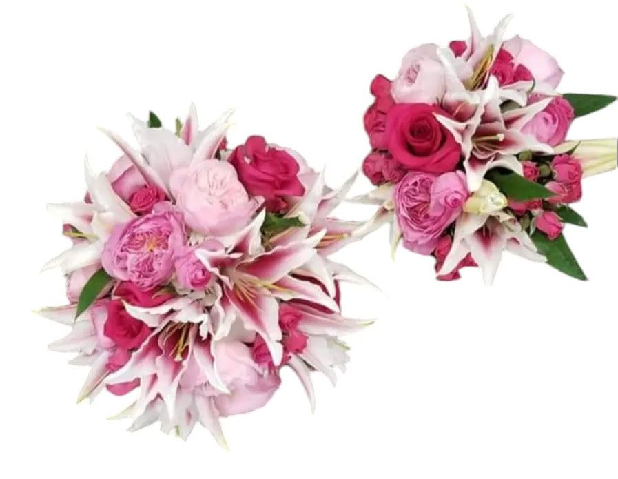 Two bouquets of pink and red flowers, including lilies and roses.