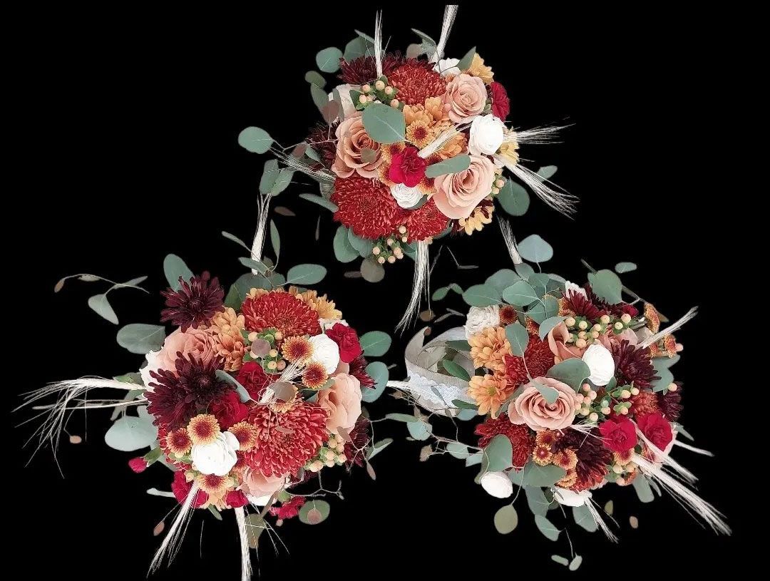Three round bouquets with rust, peach, and red flowers, on black background.