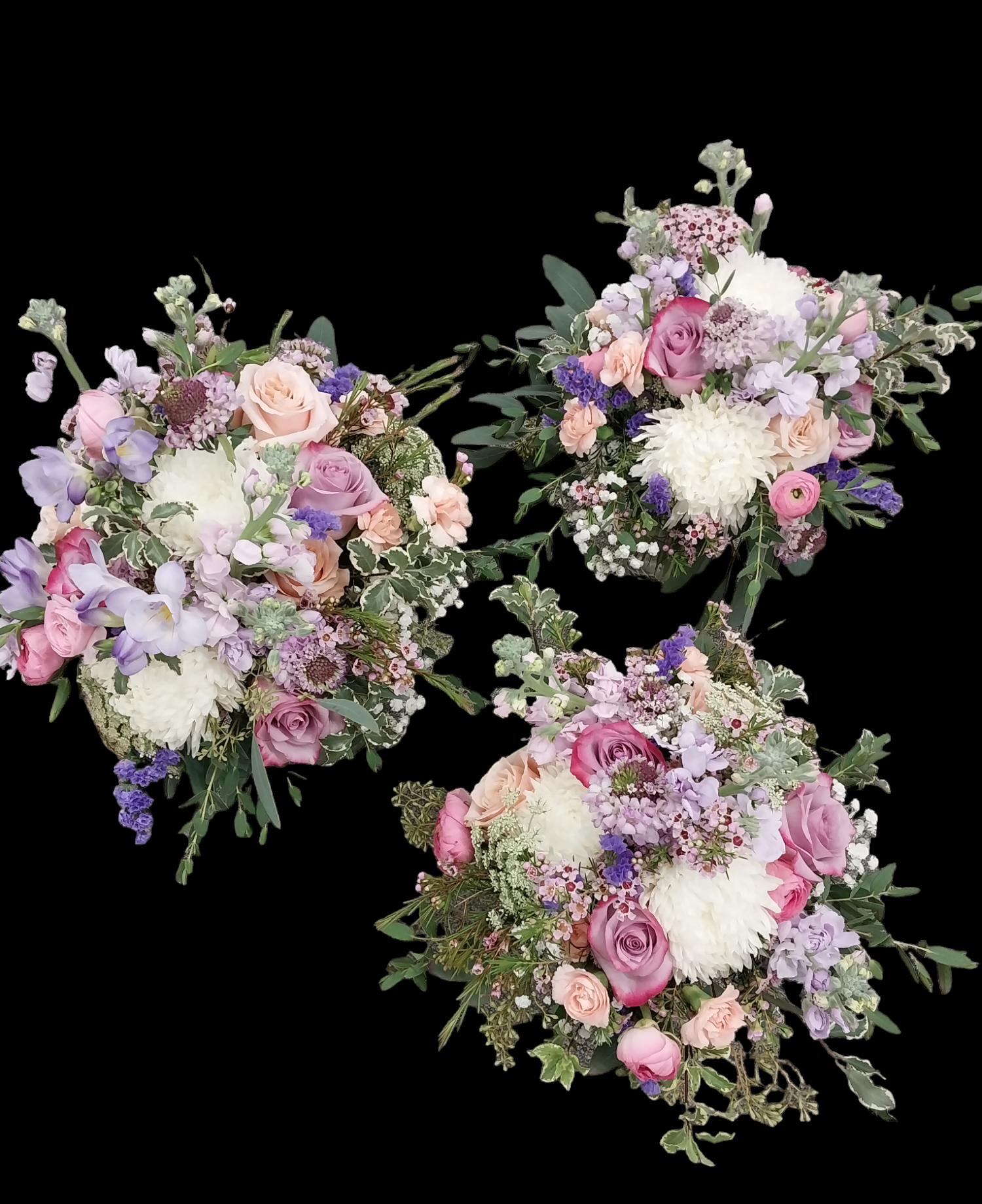 Three colorful bouquets against a black background. Each has pink, lavender, and white flowers, with green foliage.