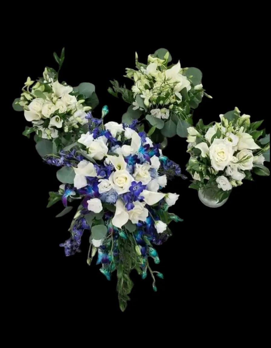 Four bouquets of white and blue flowers on a black background.