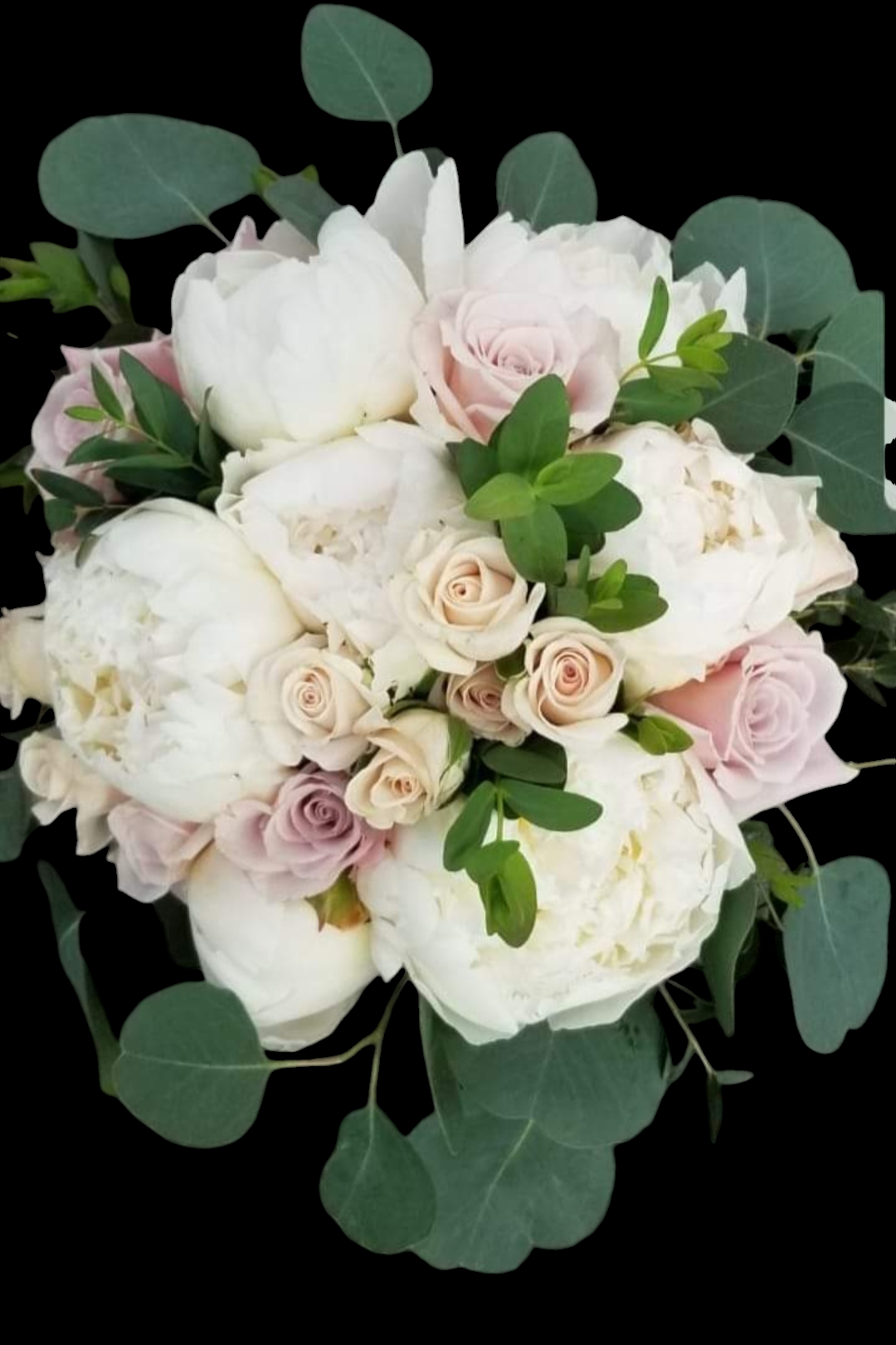 Bouquet of white peonies and light pink roses with eucalyptus leaves against a black background.