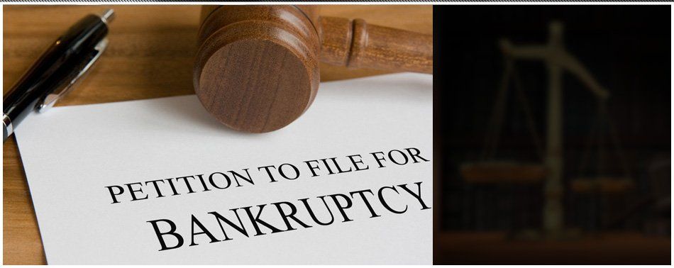 Bankruptcy concept with judge's wooden gavel and petition notice