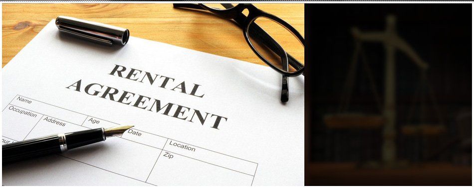 Rental agreement form on desktop in business office showing real estate