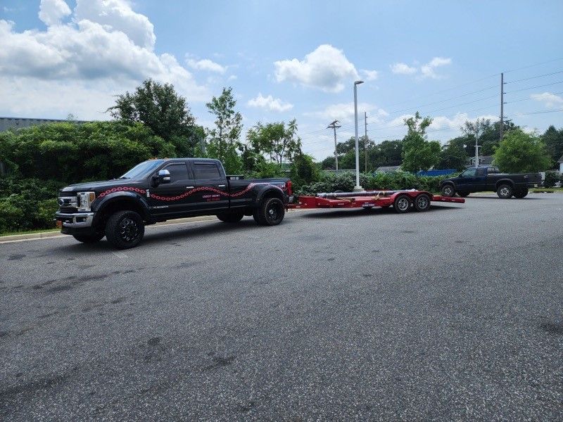 Tow truck and towing equipment