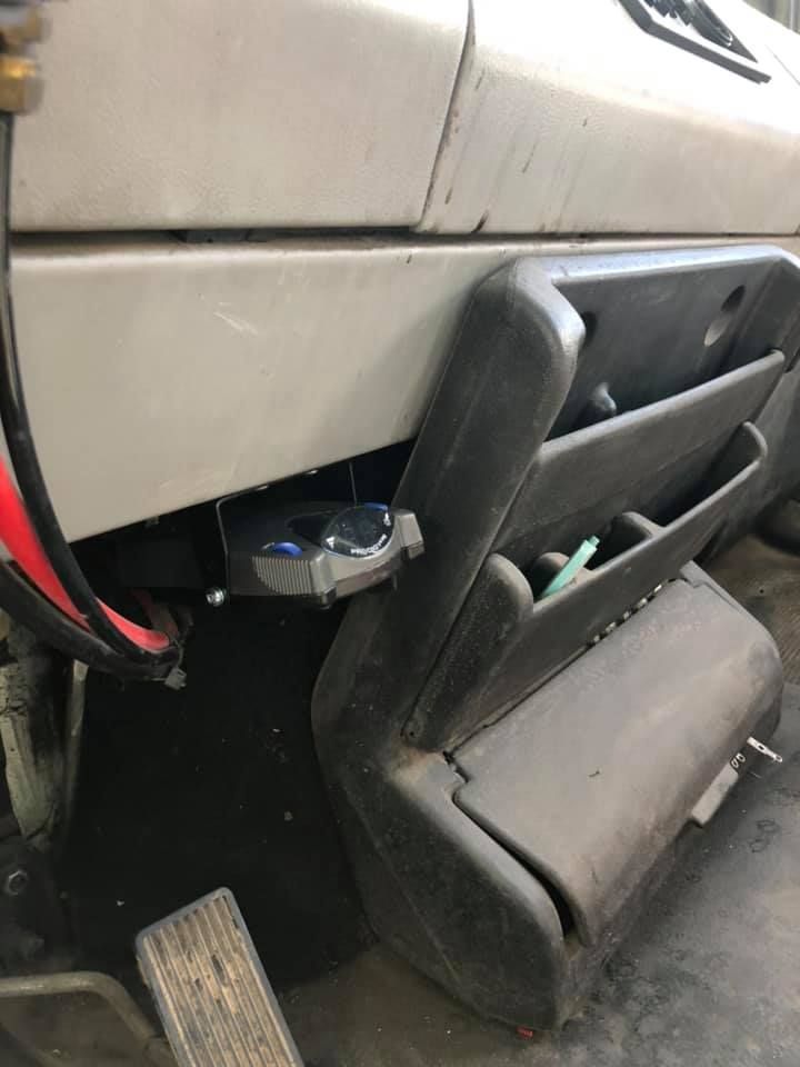 A close up of a dashboard on a truck