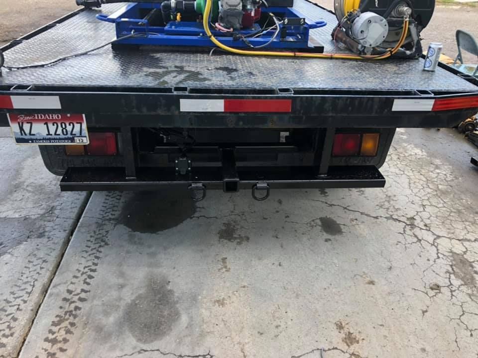 A tow truck with a idaho license plate