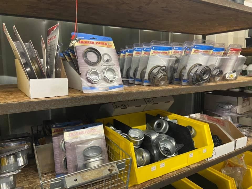 A shelf filled with lots of different types of rubber rings.