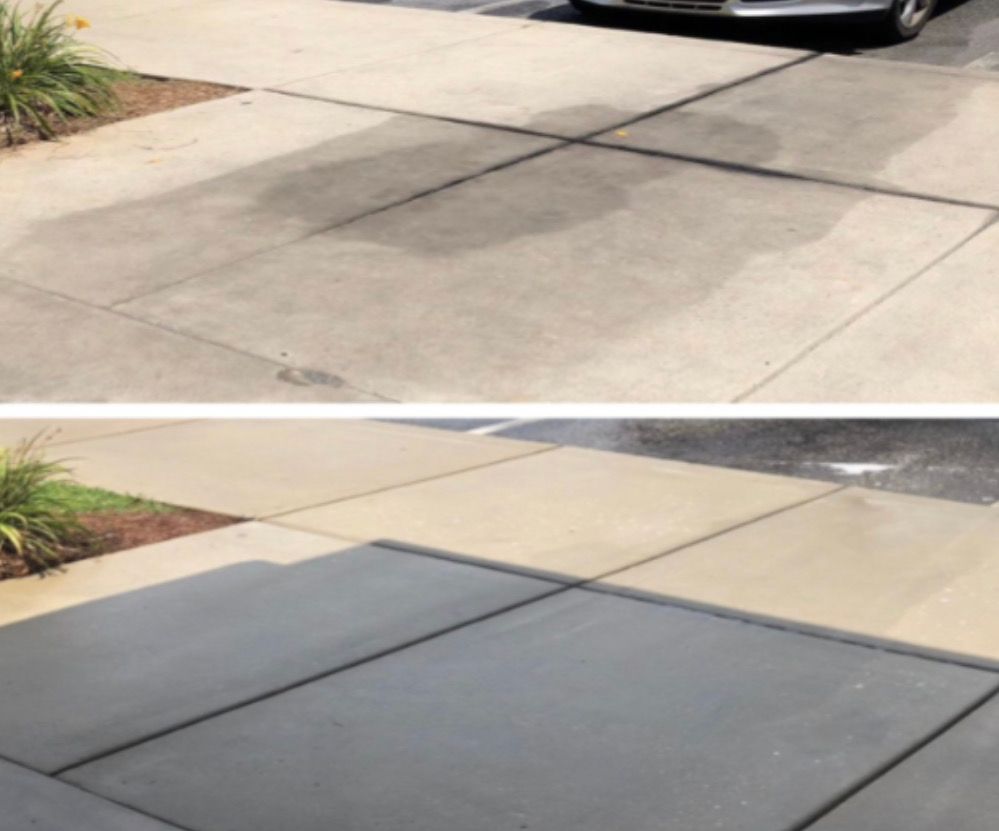 Before-and-after driveway concrete repair showing a cracked slab replaced with a smooth dark gray section