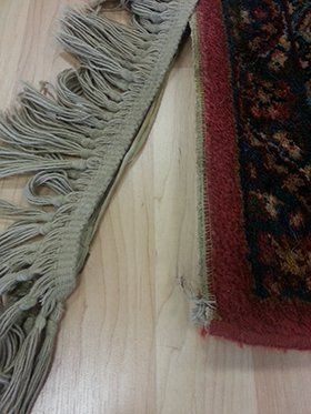 Damaged Rug Before