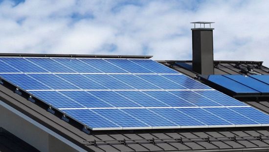 A roof with a lot of solar panels on it