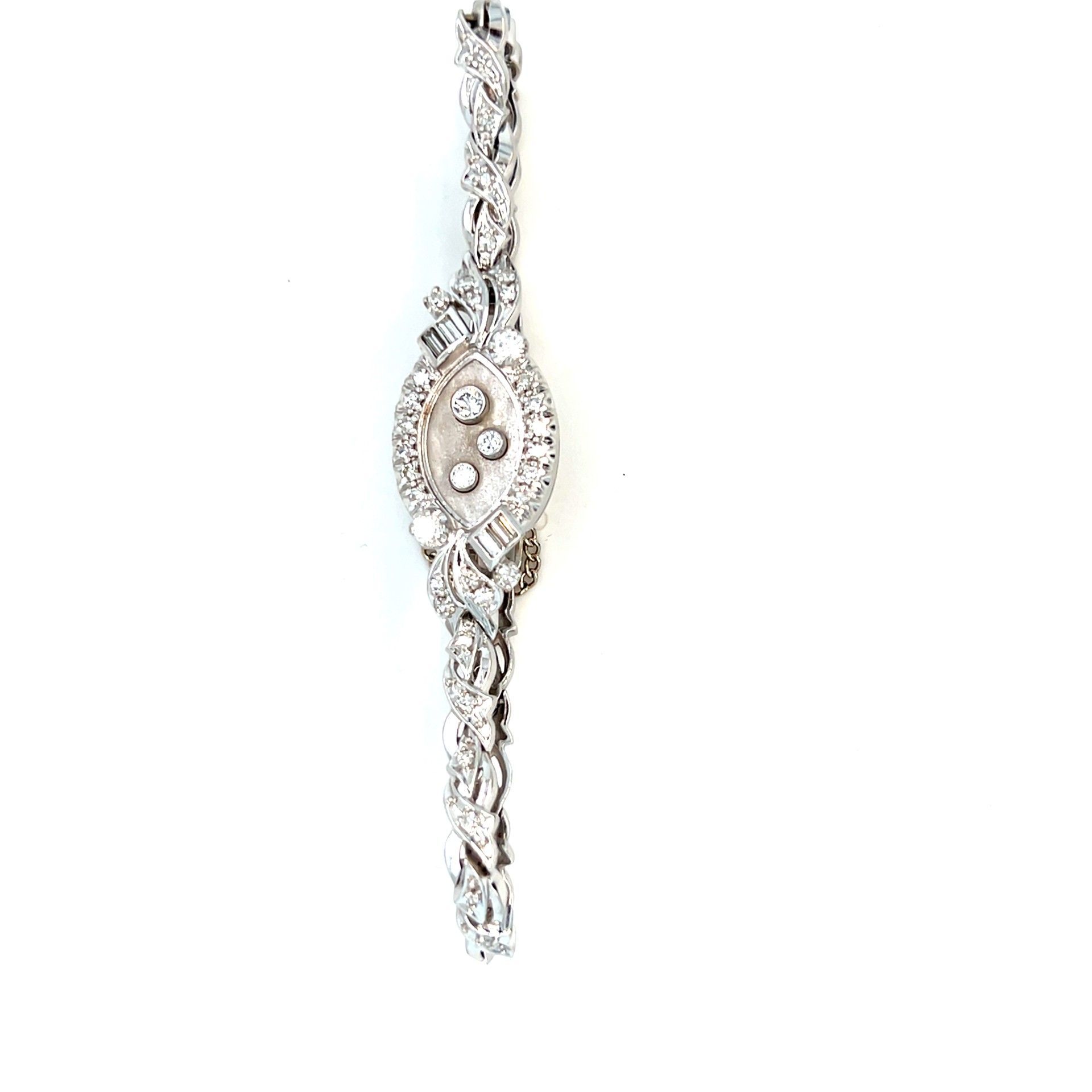 Diamond bracelet with an oval center and delicate links.