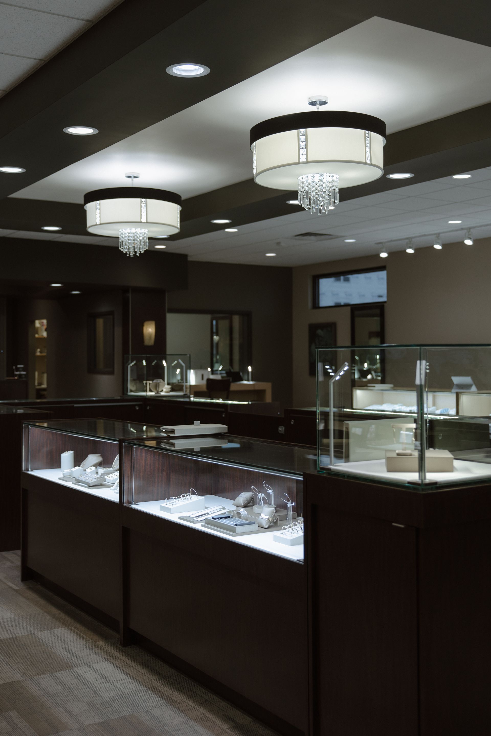 A jewelry store with a lot of display cases