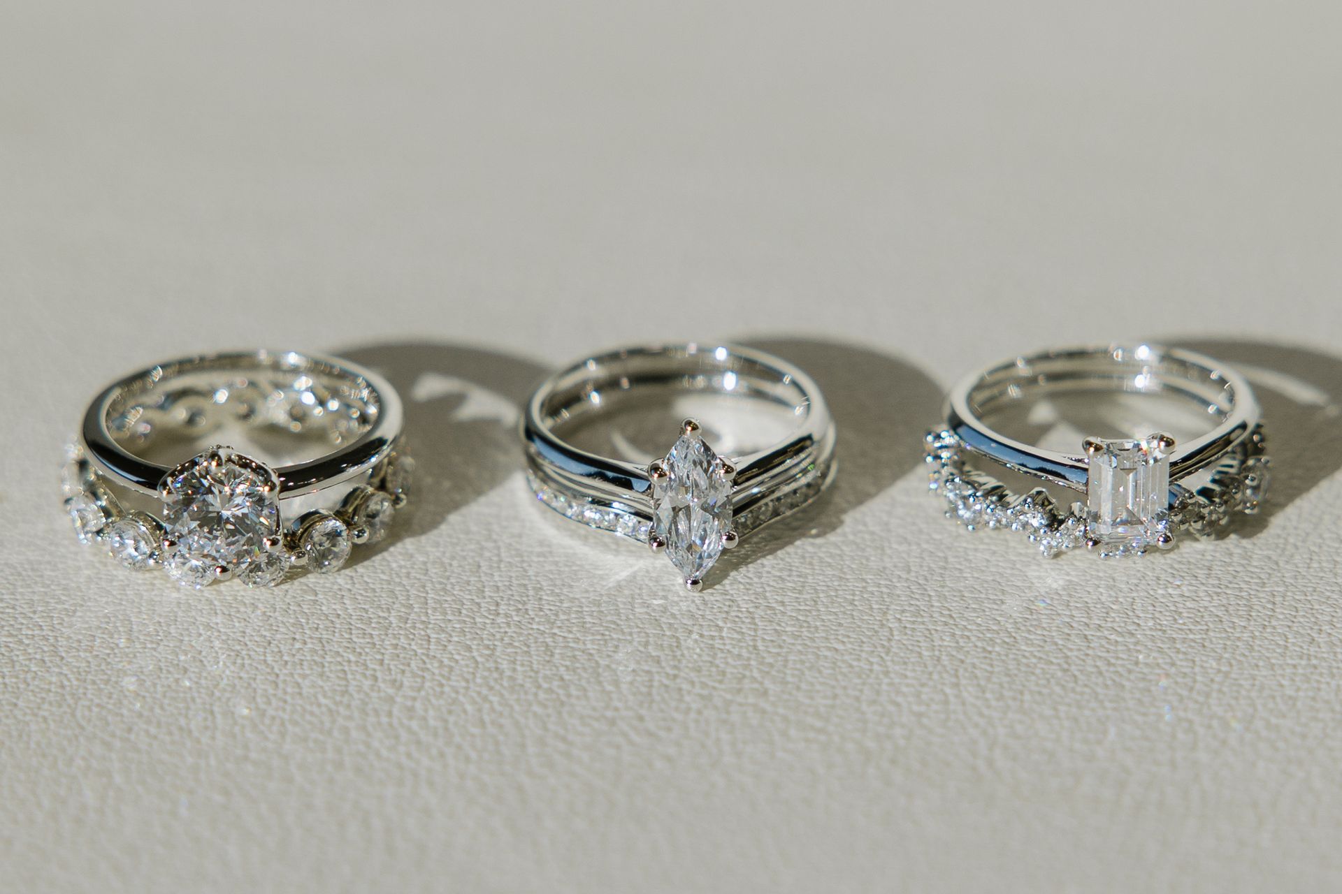 Three rings are sitting on top of each other on a table.