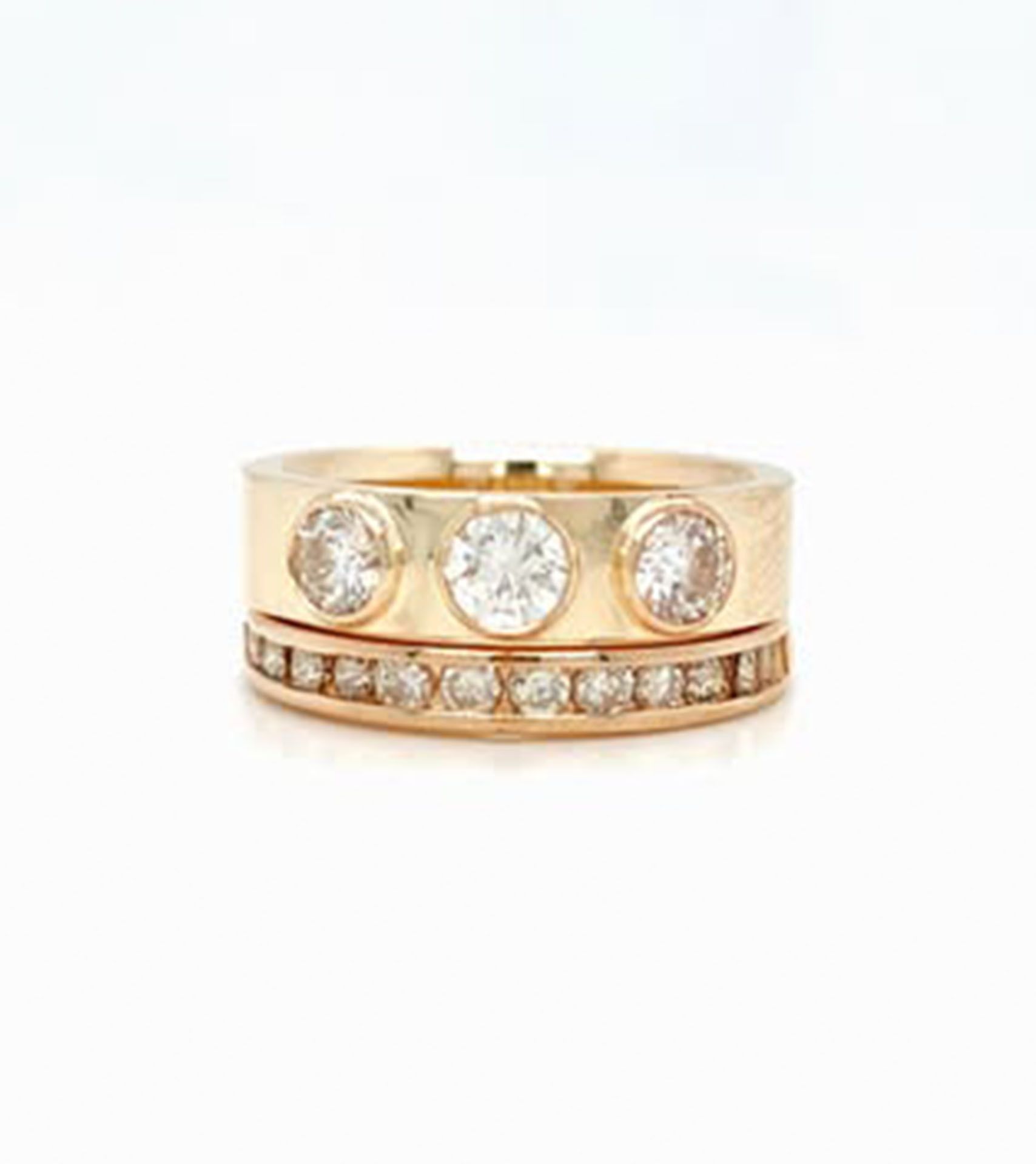 A gold ring with diamonds