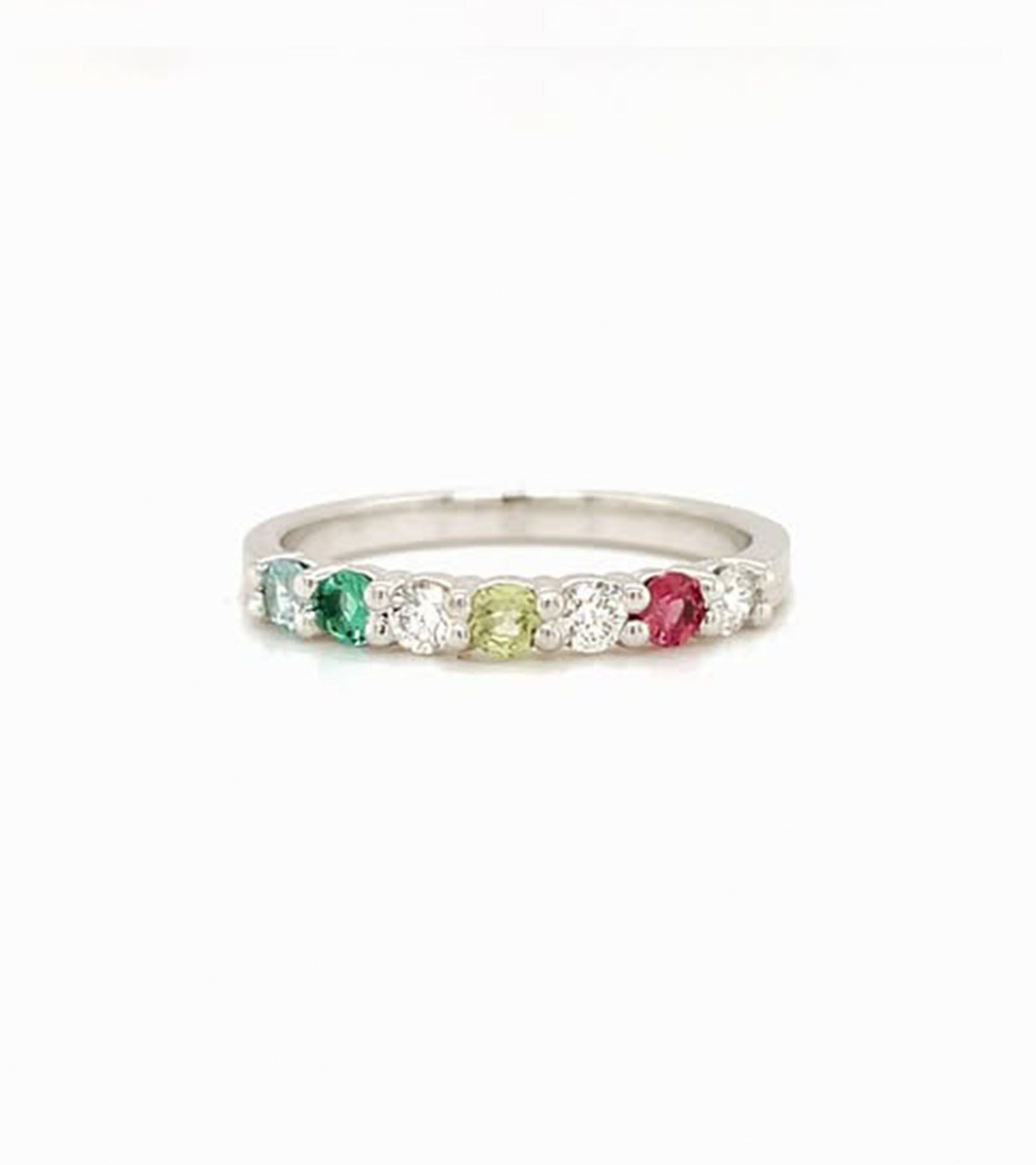 Ring with an array of colorful gemstones set in a silver band