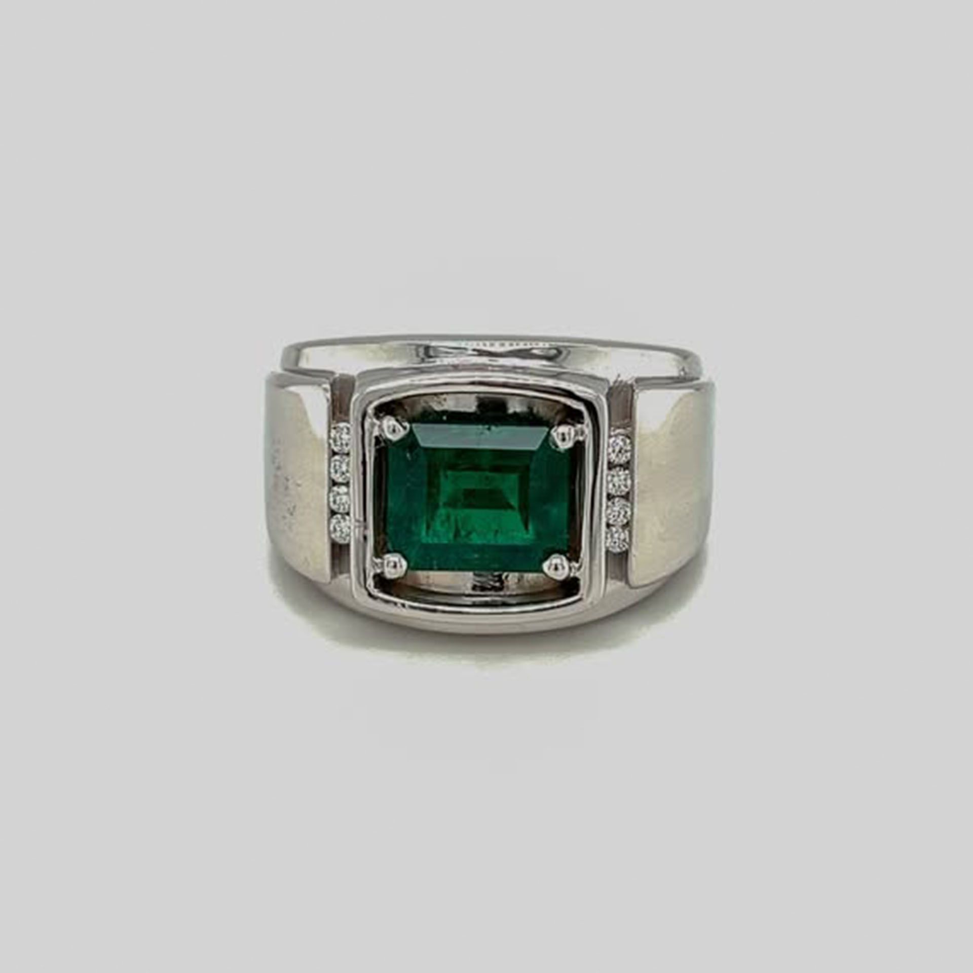 Emerald and diamond ring