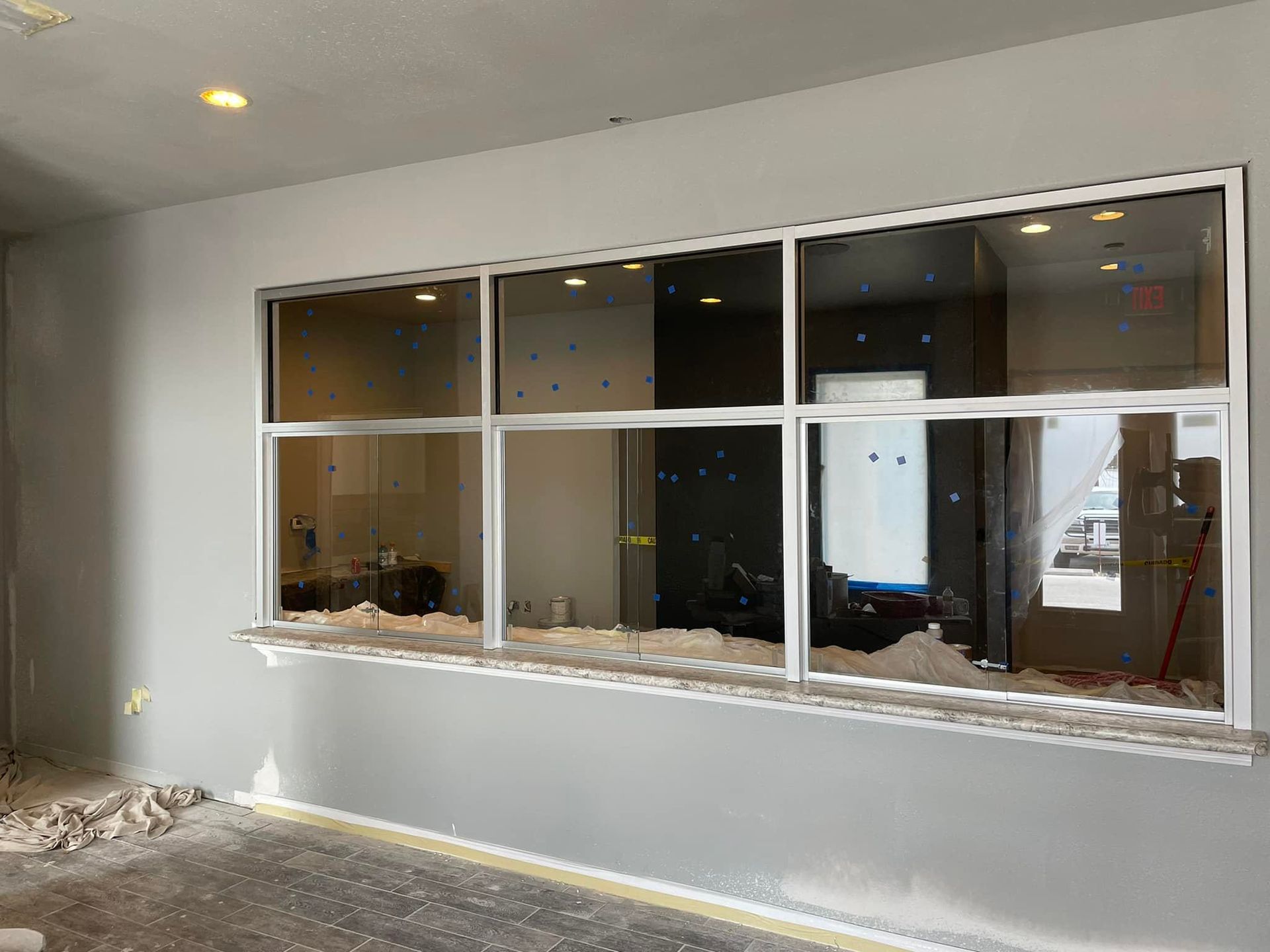 There is a large window in the middle of the room.