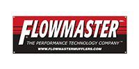 Flowmaster logo on a red and black banner with the slogan “The Performance Technology Company”