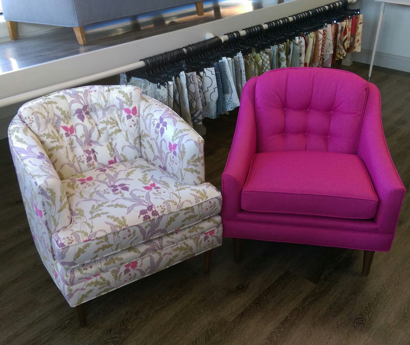 There is a couch and two chairs in the room