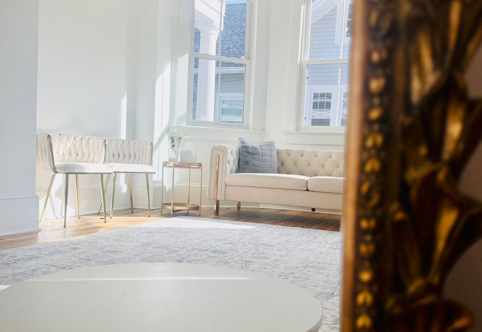 A room filled with lots of wedding dresses and suits.