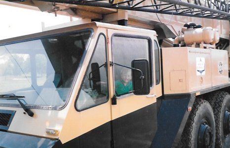 Girl inside a crane lift