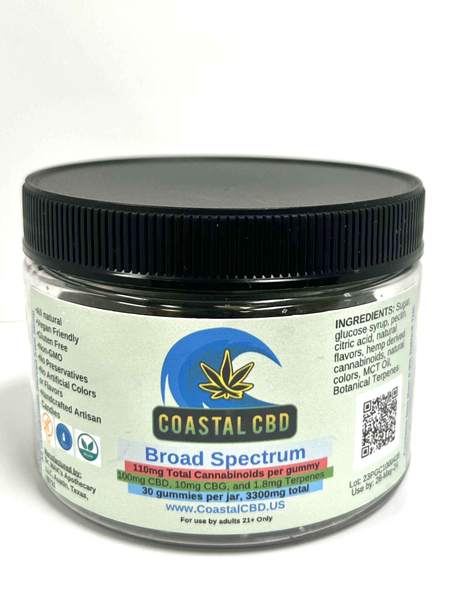 Coastal CBD Broad Spectrum jar with black lid and blue-green label on white background