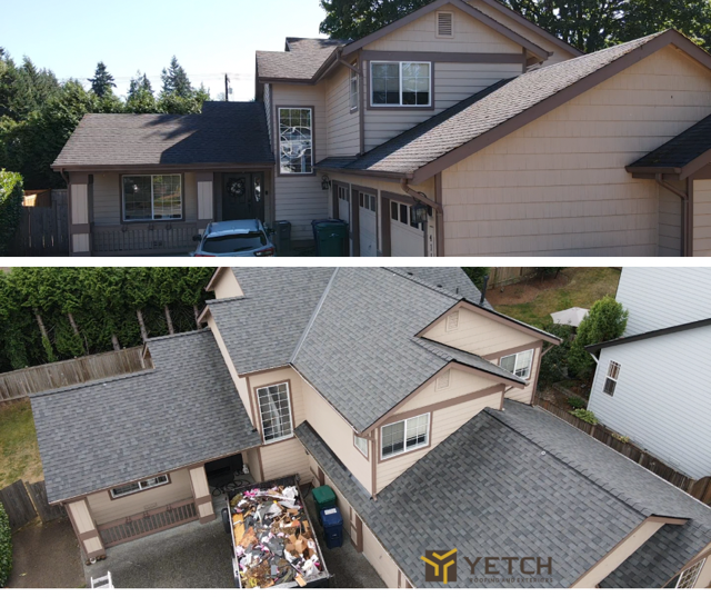 Two-story house with tan siding and gray roof, viewed from above. Green trees in the background.