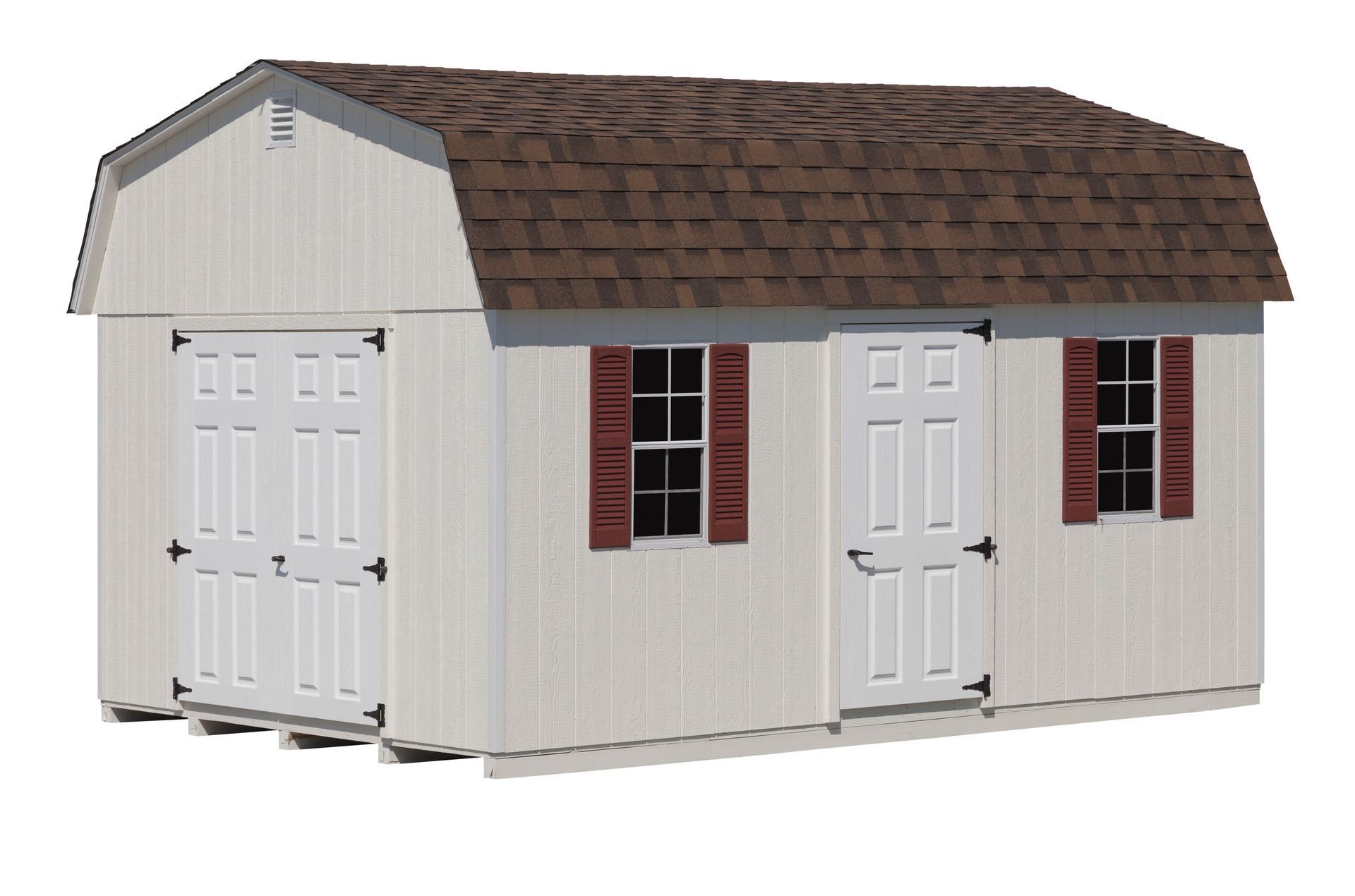 White storage shed with brown roof, two doors, window, and red shutters.