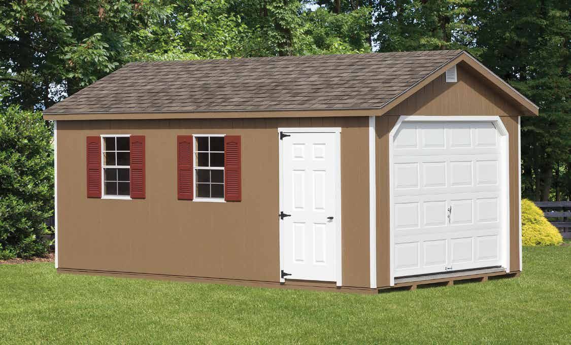 Brown shed with a white garage door, door, and two red-shuttered windows, on a green lawn.