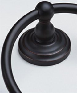 Black shower curtain rod bracket mounted on a white wall with a round decorative base