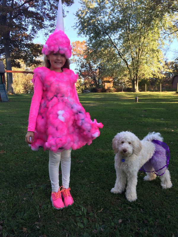 retired buttercup with kid in pink costume