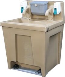 Tan portable handwashing station with soap and towel dispensers.